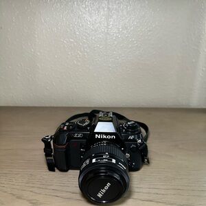 Nikon N2020 AF Film Camera with Lens, Bag, Filters and Strap Included
